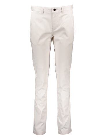 Tommy Hilfiger Spodnie chino w kolorze kremowym