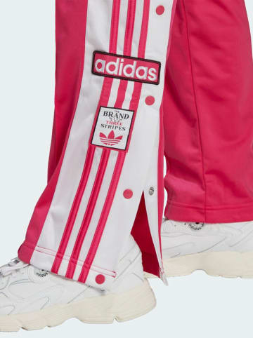 adidas Spodnie sportowe "Adibreak Tp Reamag" w kolorze różowym