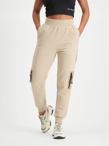 Steve Madden Spodnie dresowe "Ibreaker" w kolorze beżowym