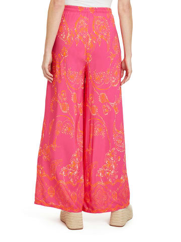 CARTOON Spodnie w kolorze różowo-pomarańczowym