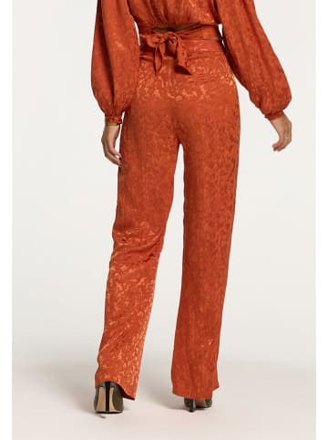 SHIWI Spodnie w kolorze pomarańczowym