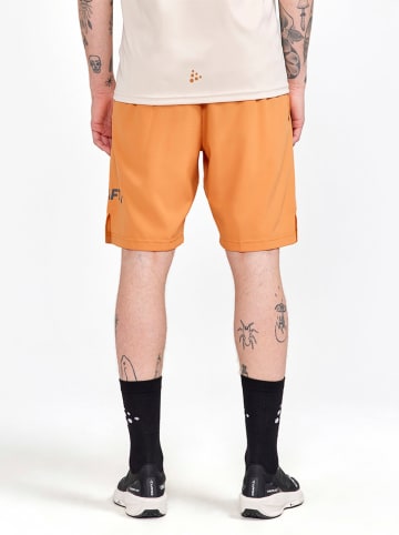 Craft Hardloopshort "Core Essence" oranje
