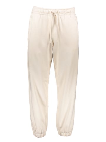 New Balance Spodnie dresowe w kolorze kremowym