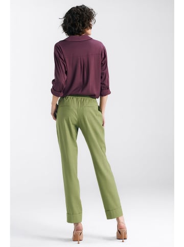 Nife Spodnie w kolorze zielonym