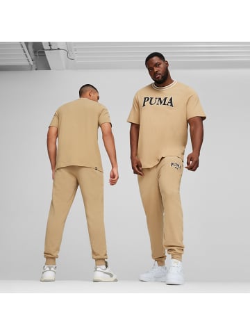 Puma Spodnie dresowe "Squad" w kolorze beżowym