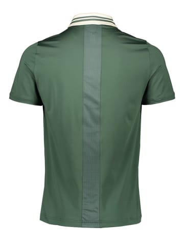 Mizuno Sportowa koszulka polo "Shadow" w kolorze zielonym