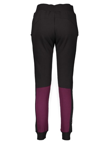 Mizuno Spodnie dresowe "Mizuno" w kolorze czarno-fioletowym