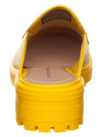 Tommy Hilfiger Skórzane chodaki w kolorze beżowo-żółtym