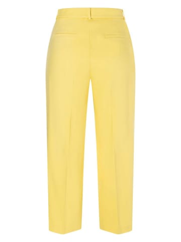 More & More Spodnie w kolorze żółtym