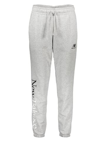New Balance Spodnie dresowe w kolorze jasnoszarym