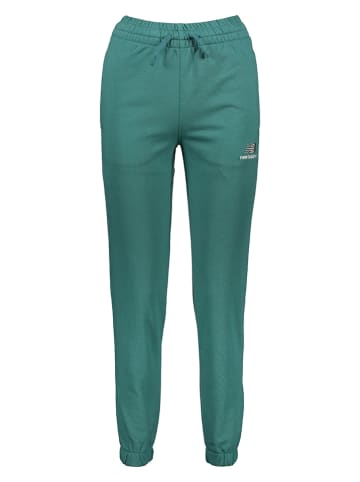New Balance Spodnie dresowe "Uni-ssentials" w kolorze zielonym