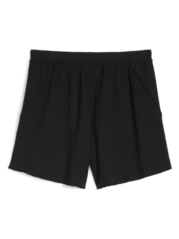 Puma Trainingsshorts "Unwind" in Schwarz