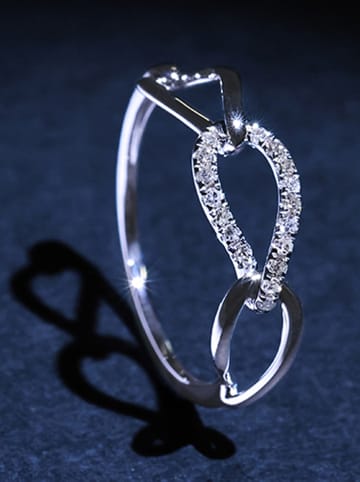 DIAMANTA Złoty pierścionek "Triple boucles" z diamentami