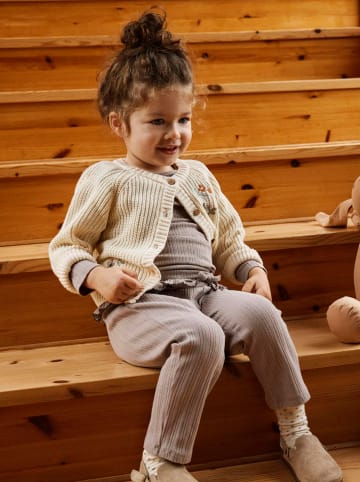 Lil Atelier Spodnie "Nara" w kolorze beżowym