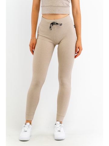 Stronger Legginsy "Cush" w kolorze beżowym