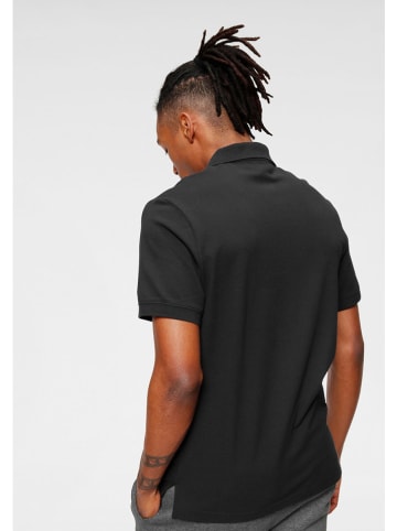 Nike Poloshirt in Schwarz