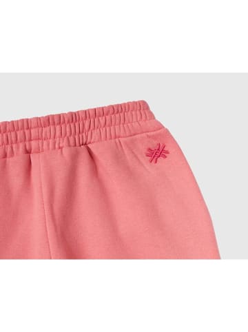 Benetton Spodnie dresowe w kolorze koralowym