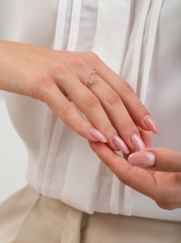 Pandora Rosévergold. Ring mit Edelsteinen