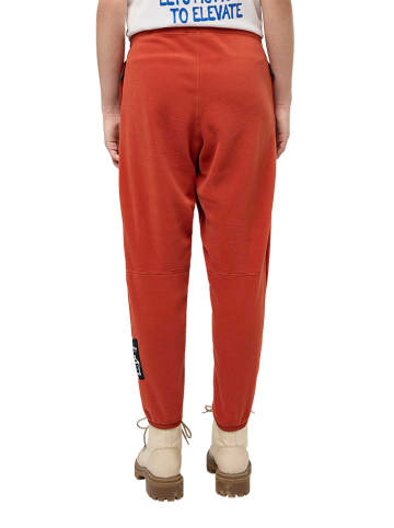 Jack Wolfskin Spodnie polarowe "Smileyworld" w kolorze pomarańczowym