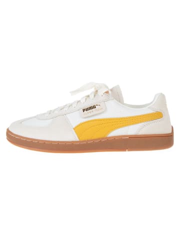 Puma Skórzane sneakersy "Super Team Currency" w kolorze beżowo-żółtym