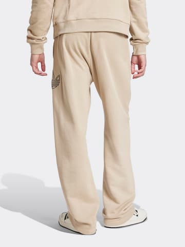 adidas Spodnie dresowe w kolorze beżowym