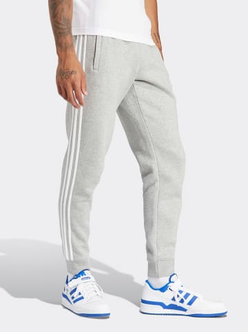 adidas Spodnie dresowe w kolorze jasnoszarym