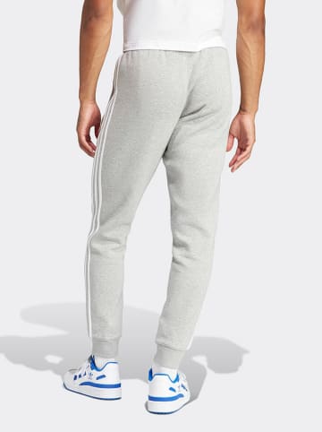 adidas Spodnie dresowe w kolorze jasnoszarym