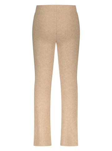 Le Chic Legginsy "Datsy" w kolorze beżowym