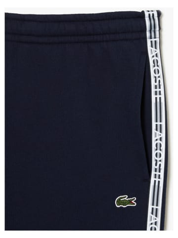 Lacoste Spodnie dresowe w kolorze granatowym