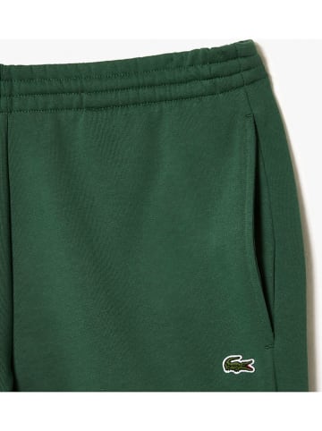 Lacoste Spodnie dresowe w kolorze zielonym