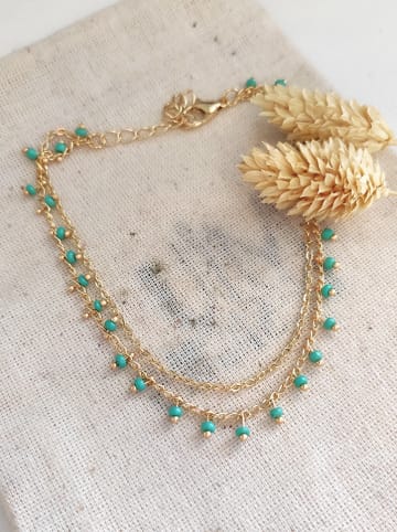 atelier MIU Vergulde enkelbandje met sierelementen