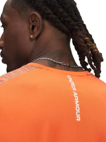 Under Armour Koszulka sportowa "Tech Utility" w kolorze pomarańczowym