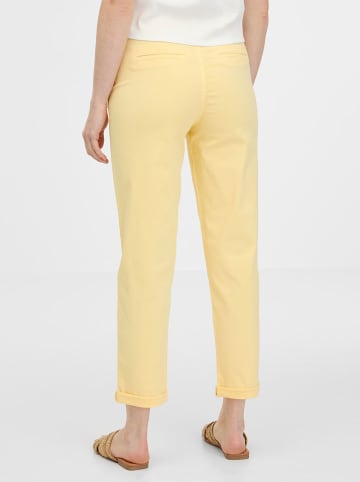 orsay Spodnie chino w kolorze żółtym