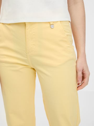 orsay Spodnie chino w kolorze żółtym