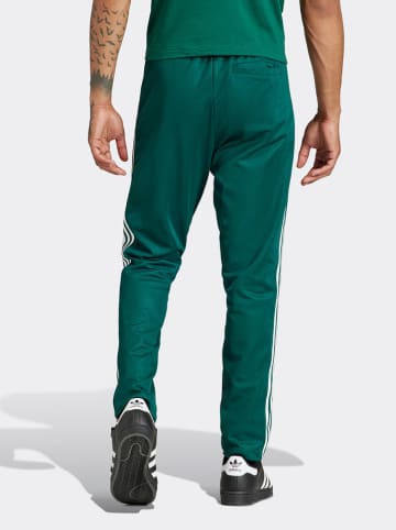 adidas Spodnie sportowe w kolorze zielonym