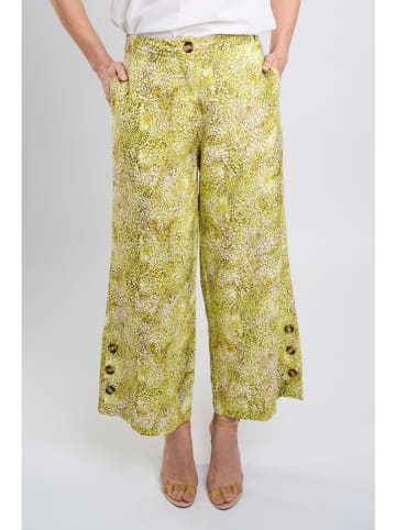 Marks & Spencer Spodnie w kolorze zielonym