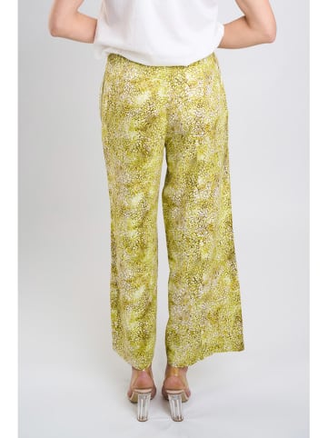 Marks & Spencer Spodnie w kolorze zielonym