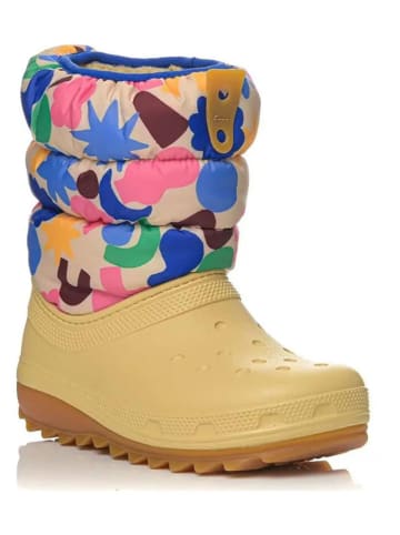Crocs Kozaki zimowe "Classic NeoPuff" w kolorze żółte ze wzorem