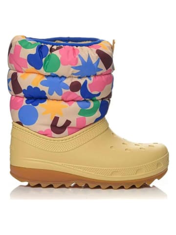 Crocs Kozaki zimowe "Classic NeoPuff" w kolorze żółte ze wzorem