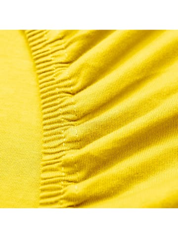 Benetton Prześcieradło w kolorze żółtym na gumce