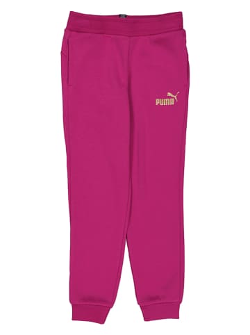 Puma Spodnie dresowe "ESS+ Glitter" w kolorze różowym