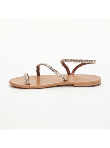 CALANK Leren teensandalen goudkleurig