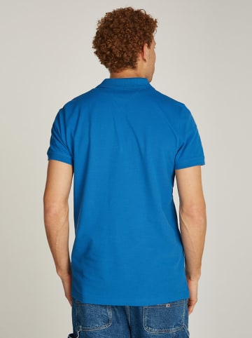TOMMY JEANS Koszulka polo w kolorze niebieskim
