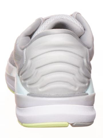 Puma Hardloopschoenen "Magnify Nitro" wit/geel
