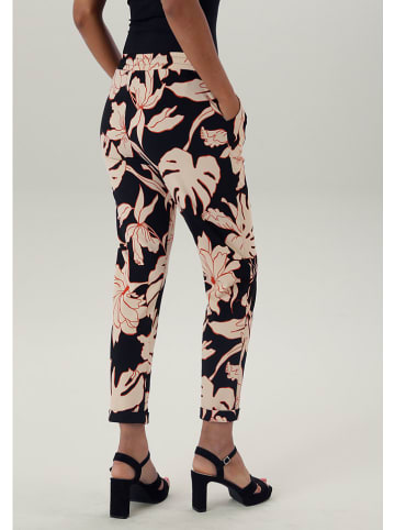 Aniston Hose in Schwarz/ Rosa