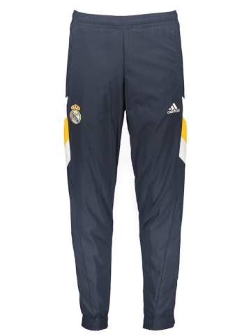 adidas Spodnie sportowe "Real Madrid" w kolorze granatowo-żółtym