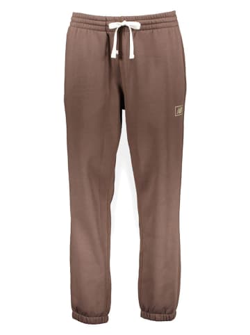 New Balance Spodnie dresowe "Essentials Brushed" w kolorze jasnobrązowym