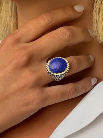 Nomad Vergold. Ring mit Edelstein