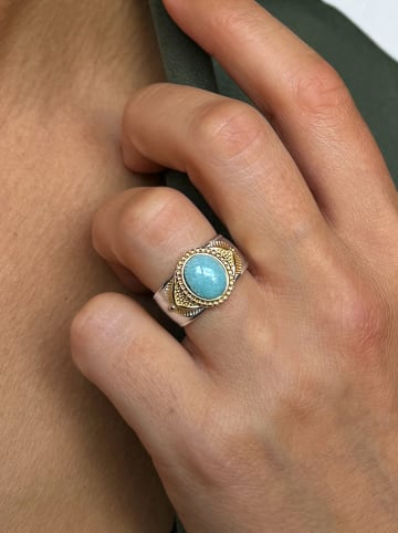 Nomad Vergold. Ring mit Edelstein