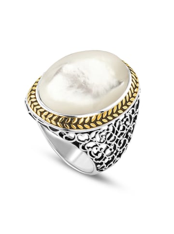 Nomad Vergold. Ring mit Edelstein